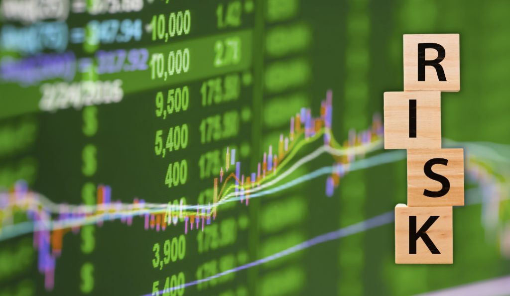 Risk spelled out on four wooden blocks and number in the background.